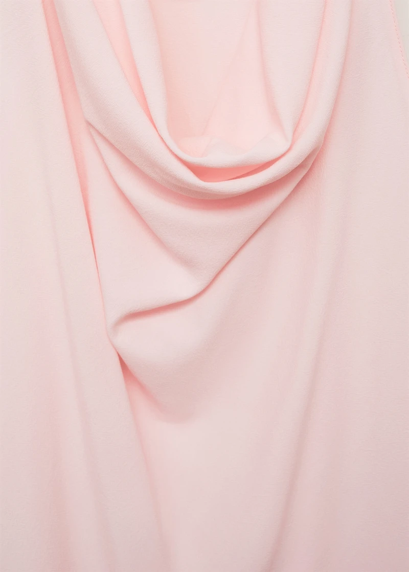 Draped blouse with flower detail
