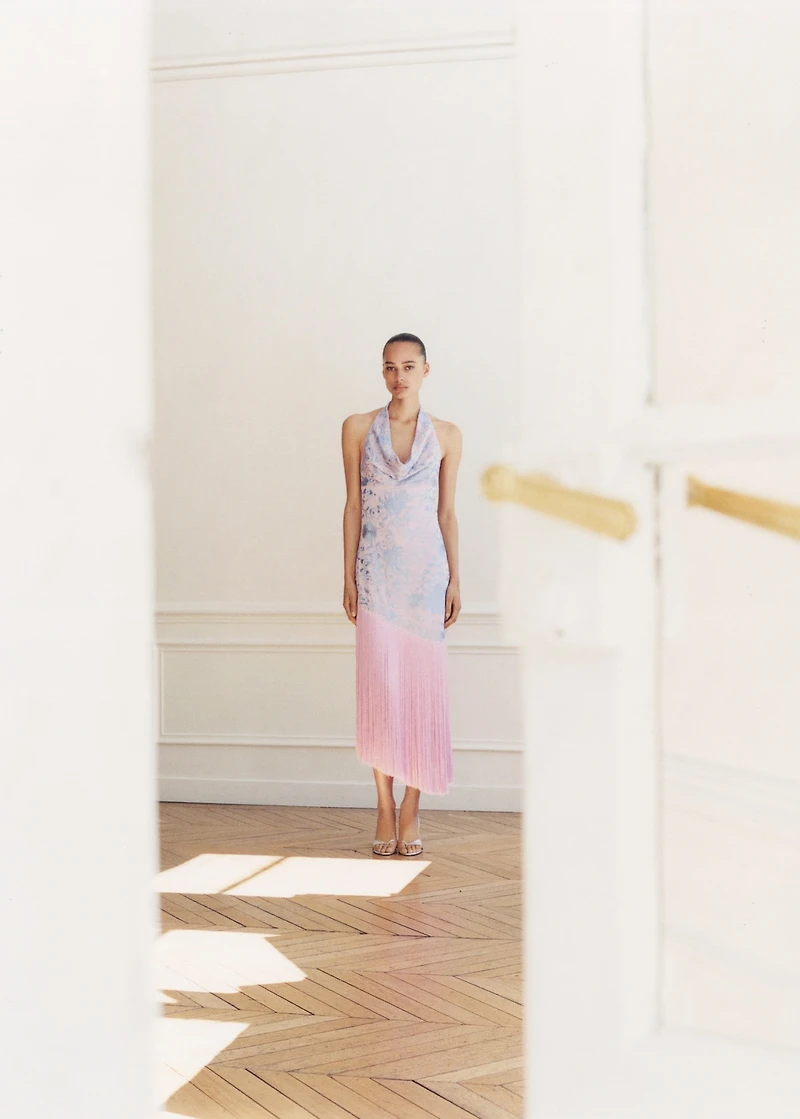 Asymmetrical dress with embroidered fringes