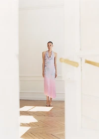 Asymmetrical dress with embroidered fringes