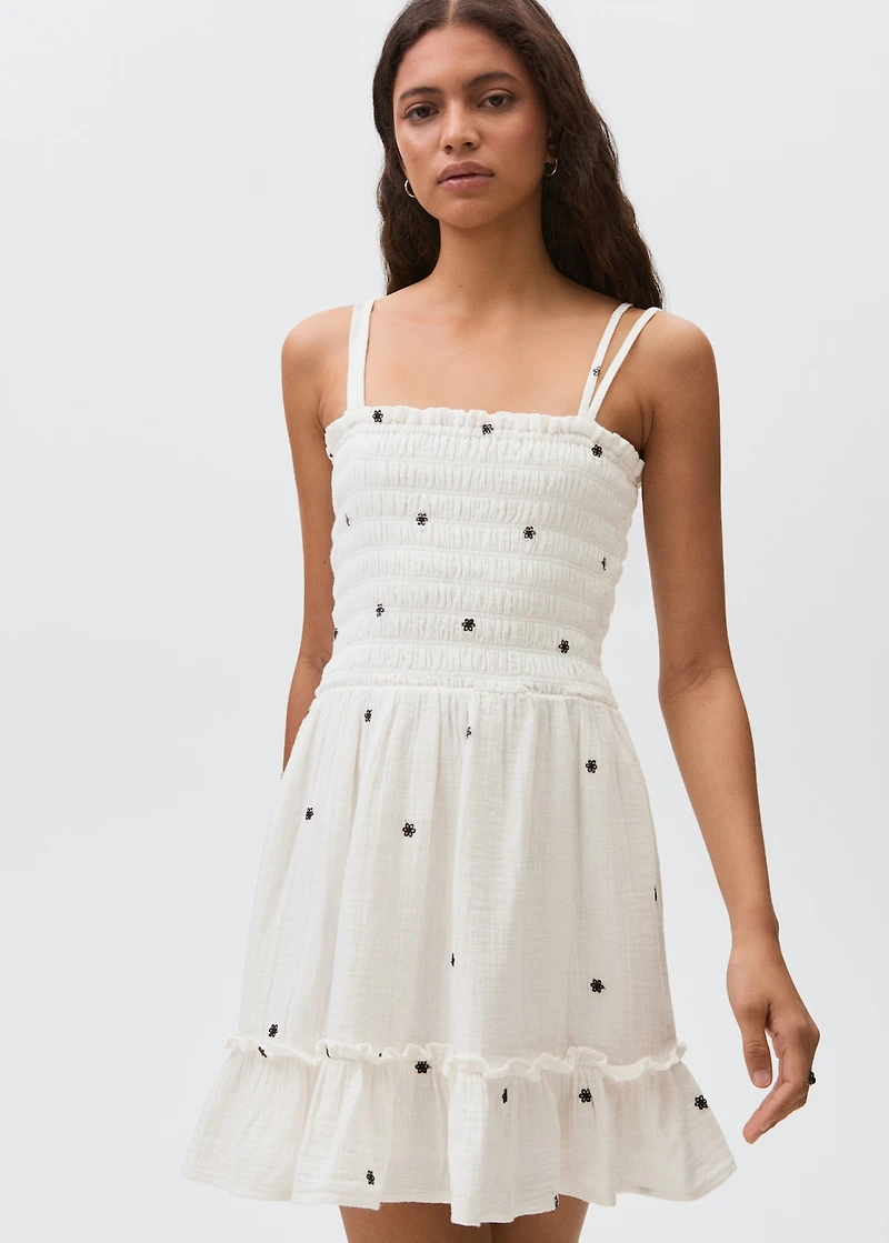 Embroidered cotton dress with floral pattern