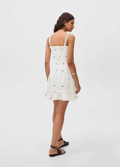 Embroidered cotton dress with floral pattern