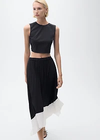 Pleated asymmetric skirt