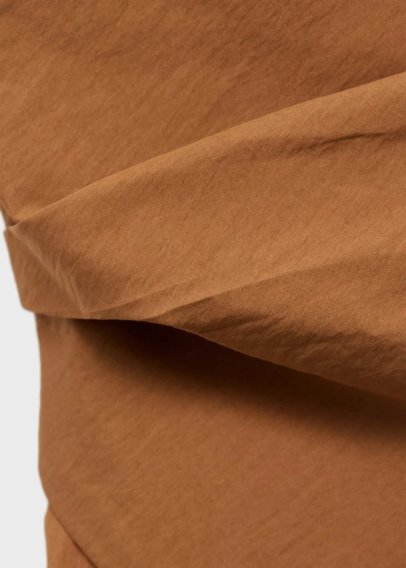 Asymmetrical strapless top