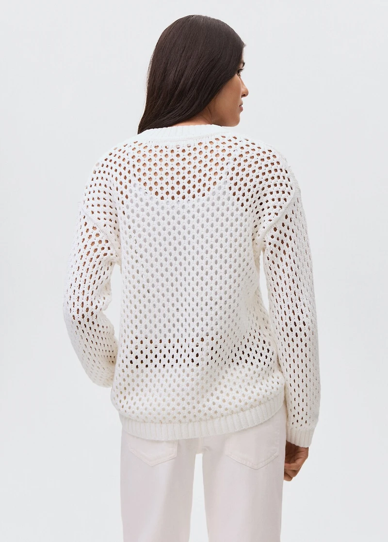 Knit sweater with lace pattern