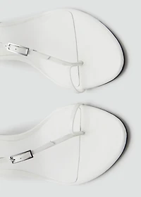 Leather heeled sandals with buckles