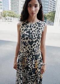 Leopard-print buttoned crop top