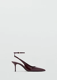 Patent heeled shoes