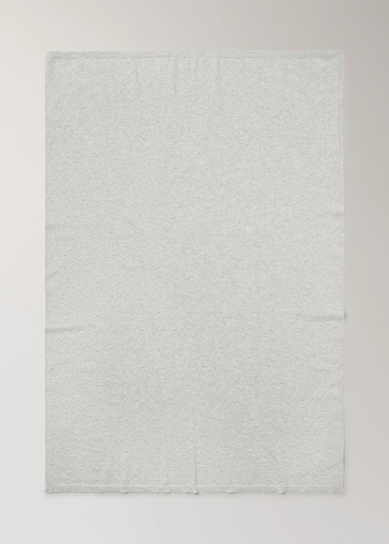 Embroidered children’s blanket with rhombus design