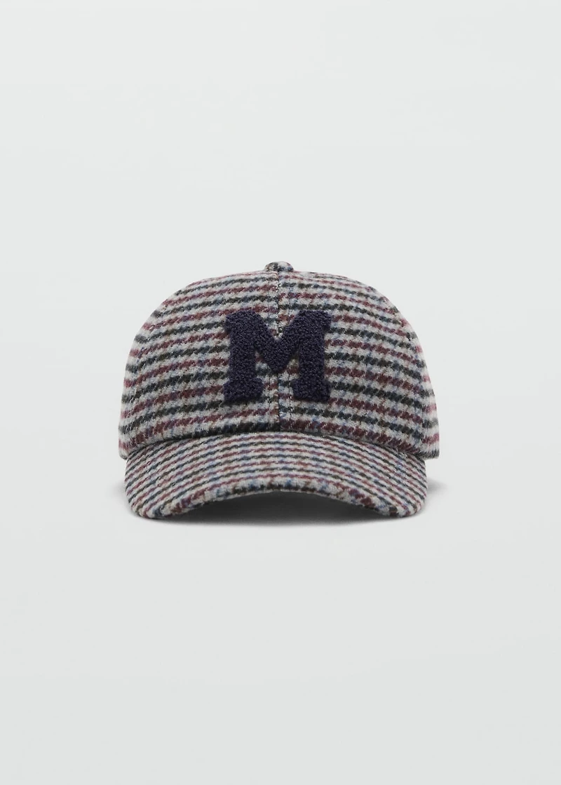 Tweed cap with letter