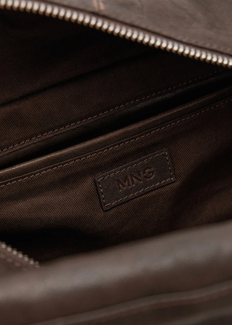 Medium leather shoulder bag with charms