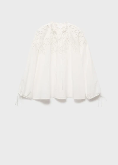 Embroidered blouse with bows