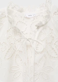Embroidered blouse with bows