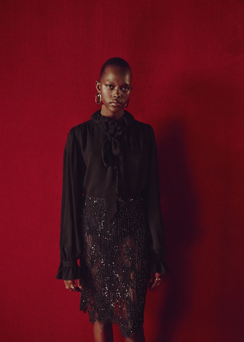 Ruffled blouse with scarf