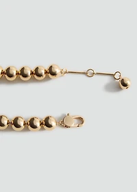 Metallic spheres necklace