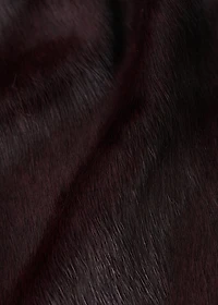 Leather jacket with fur pockets