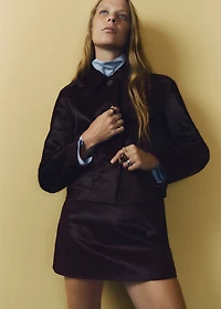 Leather jacket with fur pockets