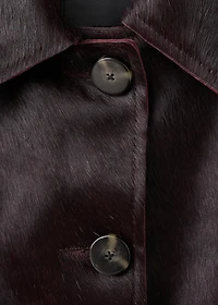 Leather jacket with fur pockets