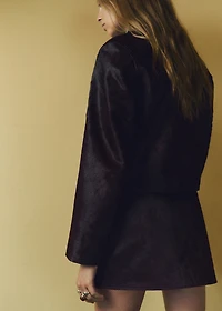 Leather jacket with fur pockets