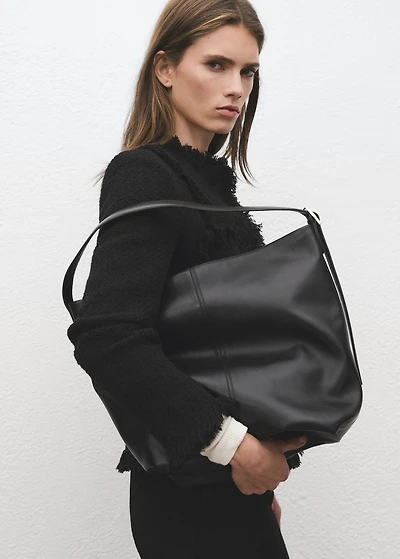 Tweed jacket with frayed ends