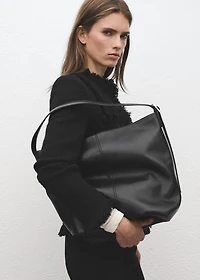 Tweed jacket with frayed ends