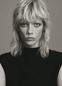 Jumpsuit with draped neck and belt