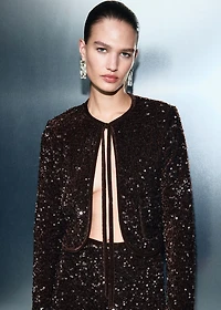 Velvet jacket with sequins and bow
