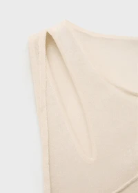 Knitted top with cut-out