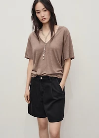 Mid-rise denim bermuda shorts with pleats