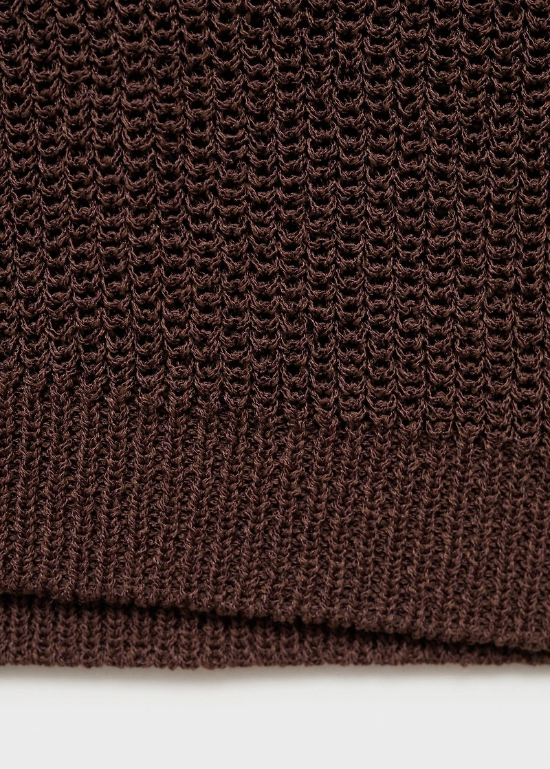 Knitted vest with lace pattern