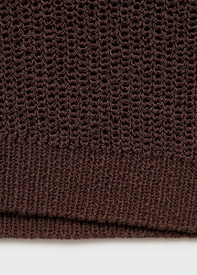 Knitted vest with lace pattern