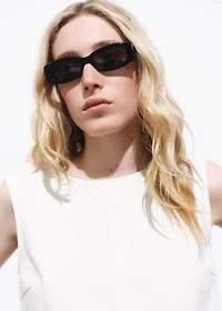 Denim crop top with buckle closure