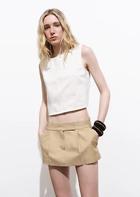 Denim crop top with buckle closure