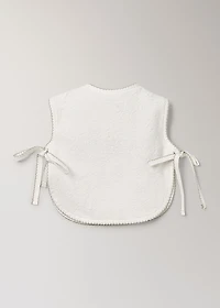 Cotton bib with decorative trim