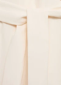 Halter-neck jumpsuit with belt