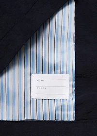 Trench coat with button detail