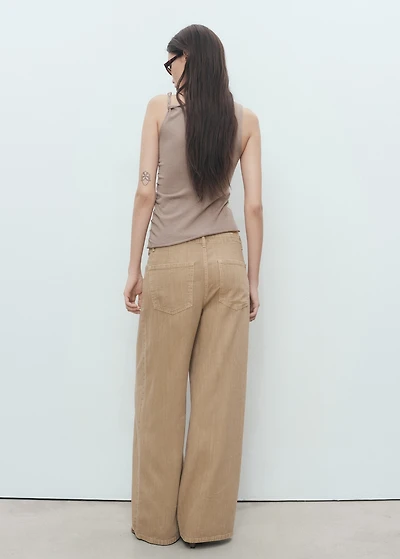 Asymmetrical knitted top with straps