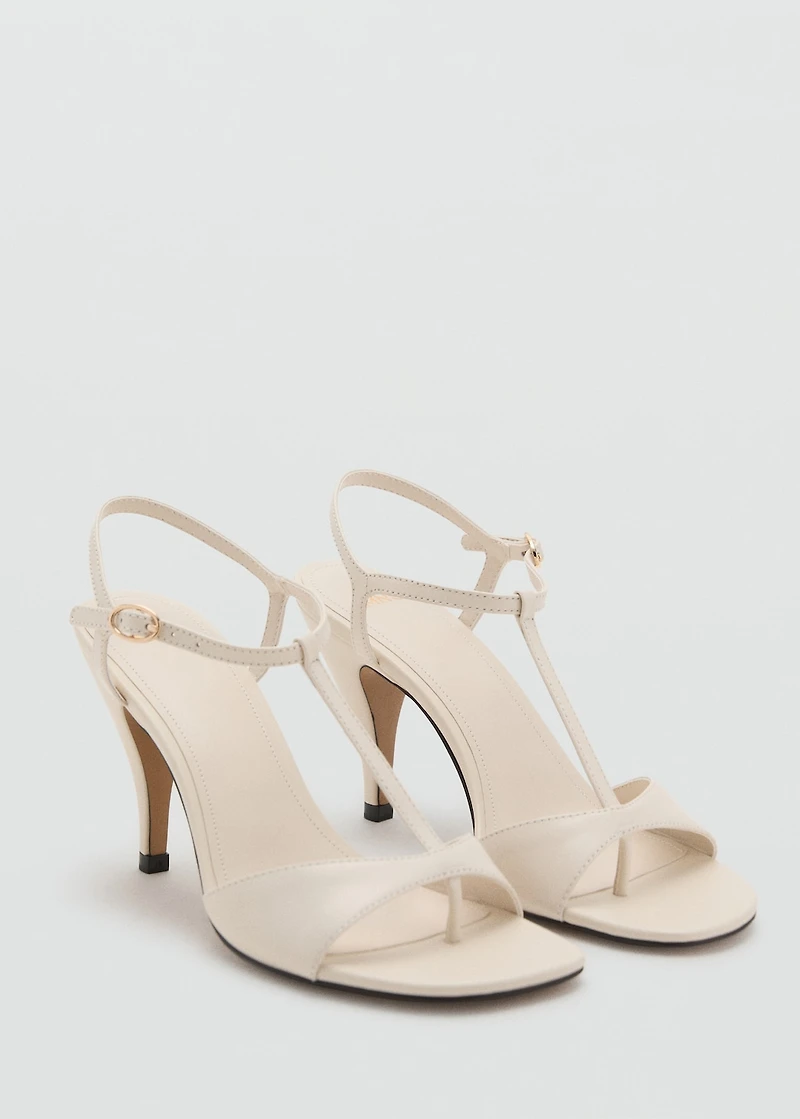 Heeled leather sandals with straps