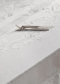 Hand-embroidered oval linen tablecloth for 6 to 8 diners