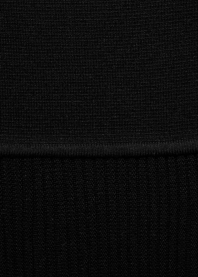 Asymmetrical combined-knit dress