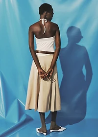 Top with perforated neckline