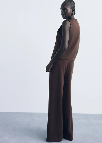 Vest with jewel buttons