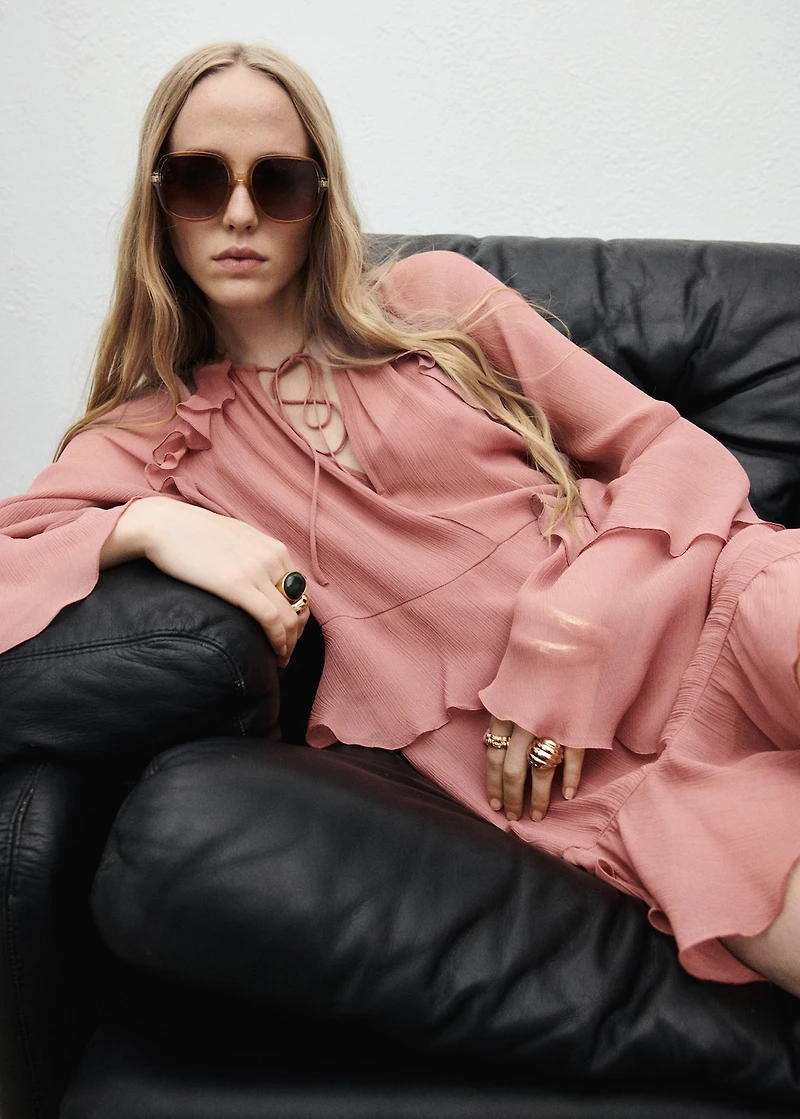 Flared dress with ruffled sleeves