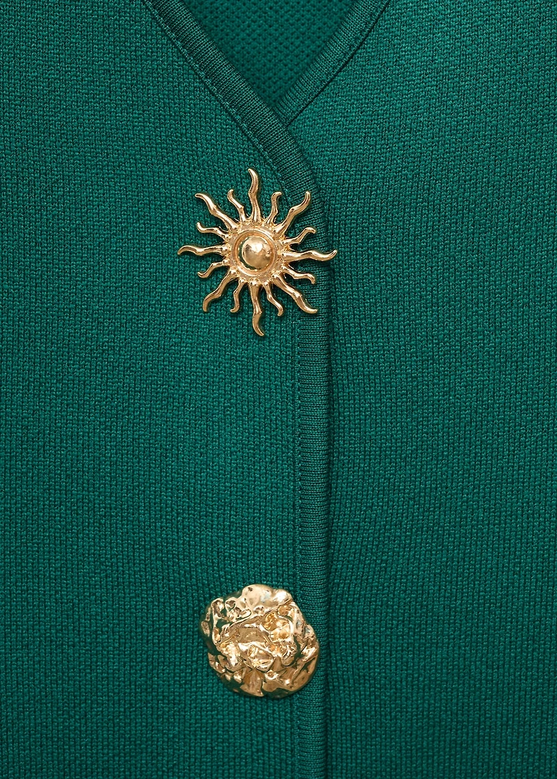 Knitted vest with jewel buttons