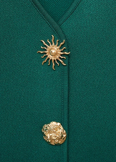 Knitted vest with jewel buttons