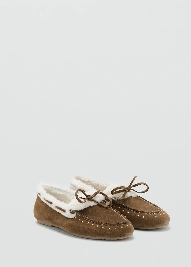 Sheepskin studded moccasins
