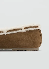 Sheepskin studded moccasins