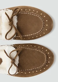 Sheepskin studded moccasins