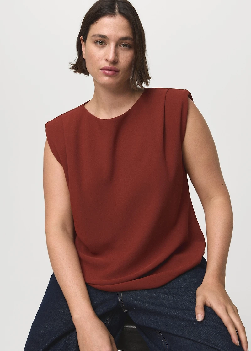 Ruched blouse with shoulder pads