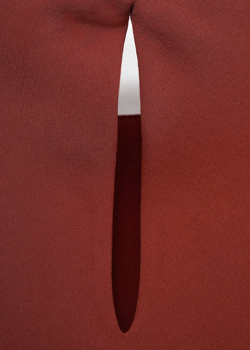 Ruched blouse with shoulder pads