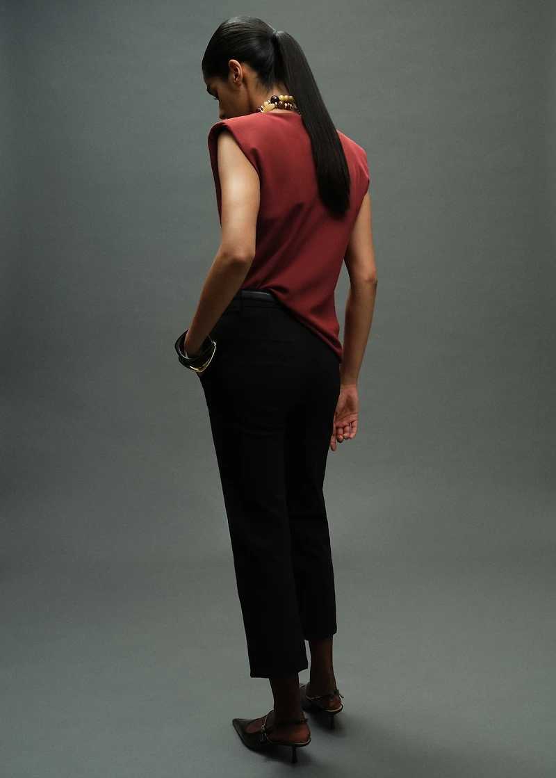 Ruched blouse with shoulder pads